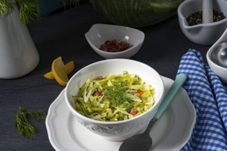 White cabbage with dill and diced bacon