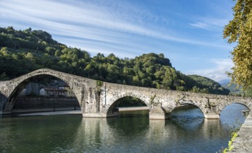 The Devils bridge or Ponte della Maddalena above Serchio river at Bongo a Mozzani town in Tuscany,