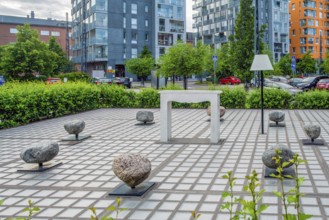 06-22-2022 Helsinki Finland a playground next to the house on which a seat in the form of rotating