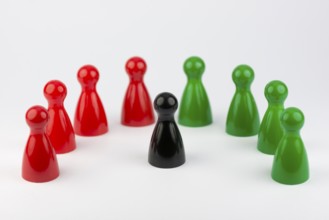 Conceptual game pawns that depict the concept different