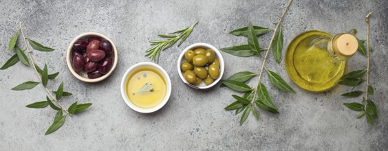 Composition with green and brown olives, extra virgin olive oil in glass bottle, olive tree