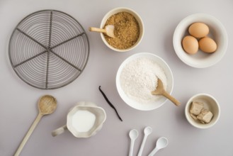 Collection of ingredients and for baking on a light-coloured surface