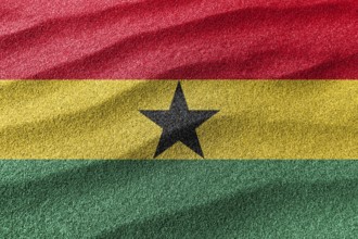 Ghana sand flag, national flag sand background