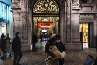 Antwerp, Flanders, Belgium, 12 28 2020 People passing by the luxury indoor shopping mall