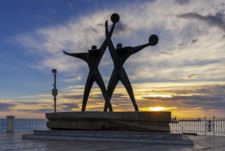 Taranto, Italy, 30 November, 2023: view of the Sailor Monument at the harbor entrance of Taranto at