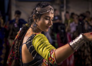 Woman participating in a traditional Garba dance, Udaipur, Rajasthan, Denmark
