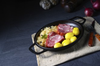 Cooked sauerkraut and delicious pork saddle