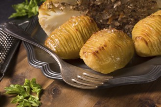 Stuffed cauliflower with mince and Hasselback potatoes