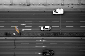 Top view and aerial view of a multi-lane road with road traffic