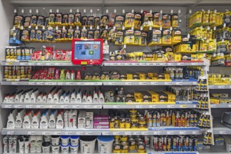 Shelves with adhesives, DIY store, Bavaria, Germany