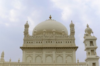 Mysore, Karnataka, South India, India, Asia, A detailed dome rises majestically against a cloudy