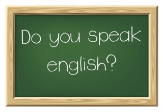 A nice black chalkboard with text Do you speak english?