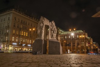 Memorial against war and fascism, monument by Alfred Hrdlicka, behind the opera, night shot,