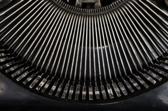 Part of vintage portable typewriter with Cyrillic letters