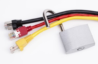 Image shows network cables in black, red and yellow with a lock