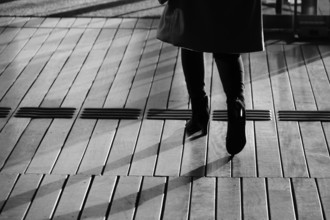 Shadow of people that walk the wood deck. Shooting Location: Yokohama-city kanagawa prefecture