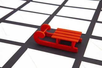 Santa Claus red carriage and Christmas envelopes. Christmas composition