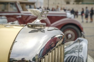 Lisbon, Portugal - Oct 15, 2023: Close-up and selective focus on the Bentley Wings Flying B mascot