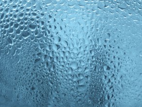 Water drops on glass close up