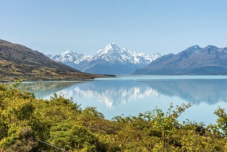 Scenic reflection of Mount Sefton and Mount Cook at lake Pukaki, South Island of New Zealand