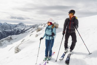 Mountaineer backcountry ski touring in the mountains. Ski touring in high alpine landscape with