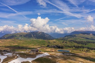Panoramic view from the Seiser Alm to the Dolomites in Italy, drone shot