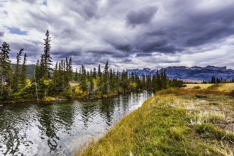 The valley along the Pocahontas road. Beautiful cloudy day in the Rockies of Canada. Slender
