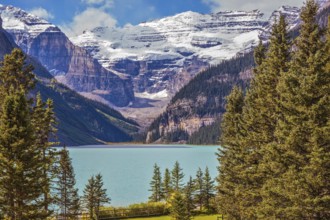 Banff National Park, Rocky Mountains, Canada. Emerald Lake is surrounded by mountains, glaciers and