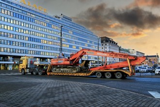 Mercedes-Benz Actros truck low loader trailer Ruoppaustyo transports Doosan DX 300 LC excavator in