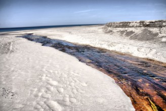 Stream flows into the sea