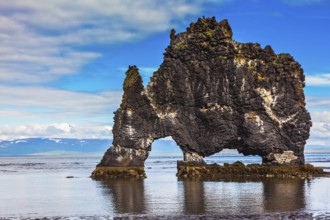 The picturesque cliff in Iceland as huge prehistoric monster. Remains of an ancient extinct volcano