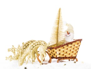 Christmas snowman with gold tree on the sledge
