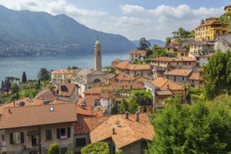 Old church in town at the coast of Como lake, Italy