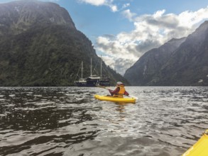 Canoeing through magnificent Doubtful Sound, South Island of New Zealand