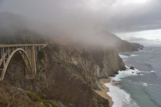 Road along Pacific coast USA and the bridge above a precipice