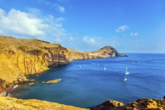 The west coast of Madeira - the bay between the rocks with yachts and boats. Madeira is island in