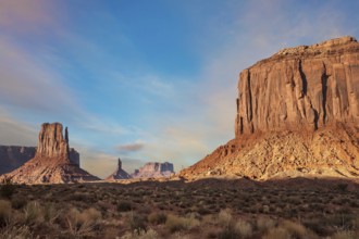 The famous cliffs Mittens in Monument Valley. The rocks - outcrops made of red sandstone. Bright
