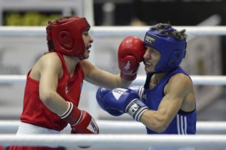 Sofia, Bulgaria - 26 February, 2021: Angelina Lukas (red) of Kazakhstan and Lacramioara Perijoc of