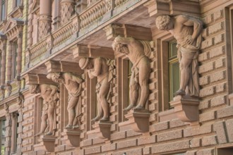 House on Börsenplatz, male figures on balcony, red sandstone, Frankfurt am Main, Hesse, Germany
