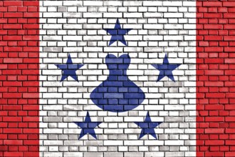 Flag of Austral Islands painted on brick wall