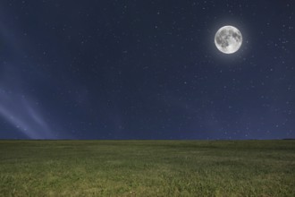 Night sky meadow background with moon and stars. Full moon