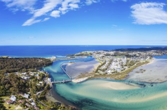 Aerial view of the idyllic coastal town of Narooma wrapped around the famous Wagonga Inlet in South