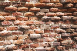 Not restored wall of an old bricklaying