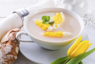 Polish Easter soup with egg and sausage