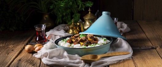 Tajin beef stew with rice, peppers and sesame seeds