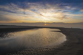 Sunset over the North beach of Borkum with beautiful sky