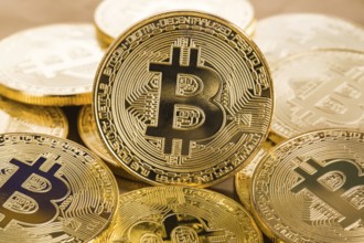 Bitcoins on a light background