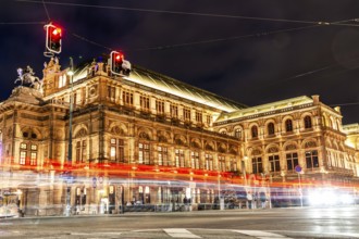 Vienna State Opera, light traces of a tram, night shot, Vienna, Austria