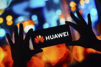 In this photo illustration, the Huawei Technologies logo is displayed on a smartphone mobile screen