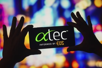 In this photo illustration, the ATEC Spine logo is displayed on a smartphone screen